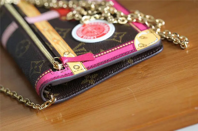 2018 premium monogram canvas pochette weekend clutch m62456 4