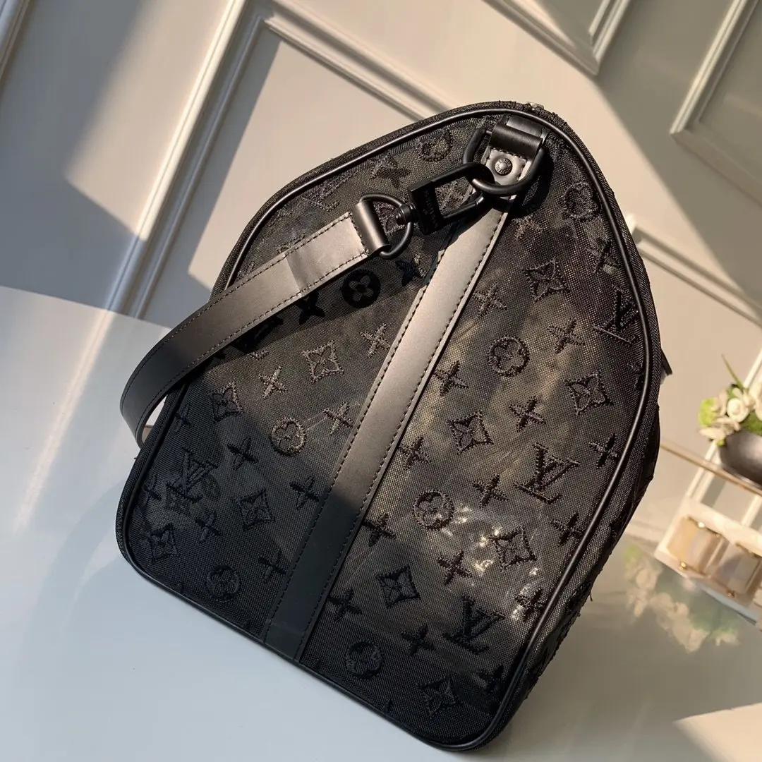 2019 monogram embossed keepall bandouliere 50 m53971 4 2019 monogram embossed keepall bandouliere 50 m53971 4