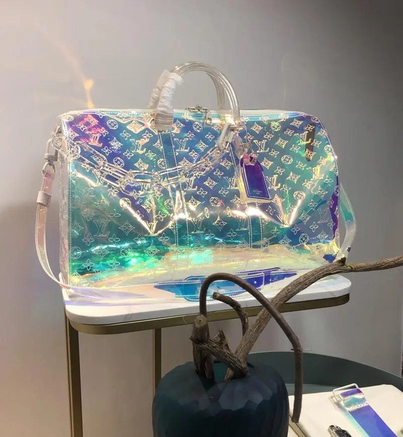 2019 monogram embossed pvc keepall bandouliere 50 m53271 4 2019 monogram embossed pvc keepall bandouliere 50 m53271 4
