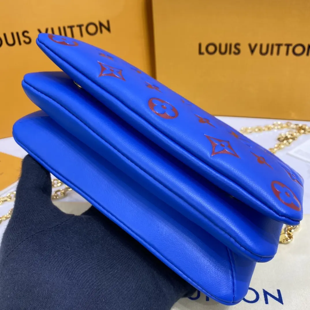 embossed lambskin pochette coussin blue red m80743 11
