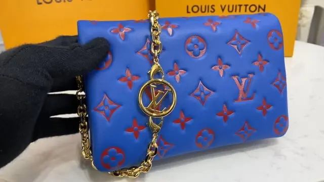 embossed lambskin pochette coussin blue red m80743 4