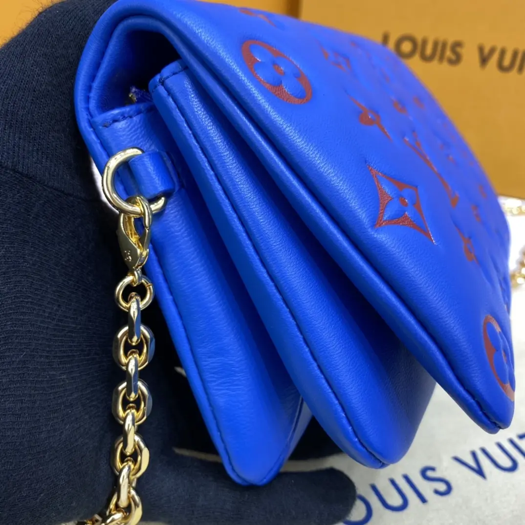 embossed lambskin pochette coussin blue red m80743 8
