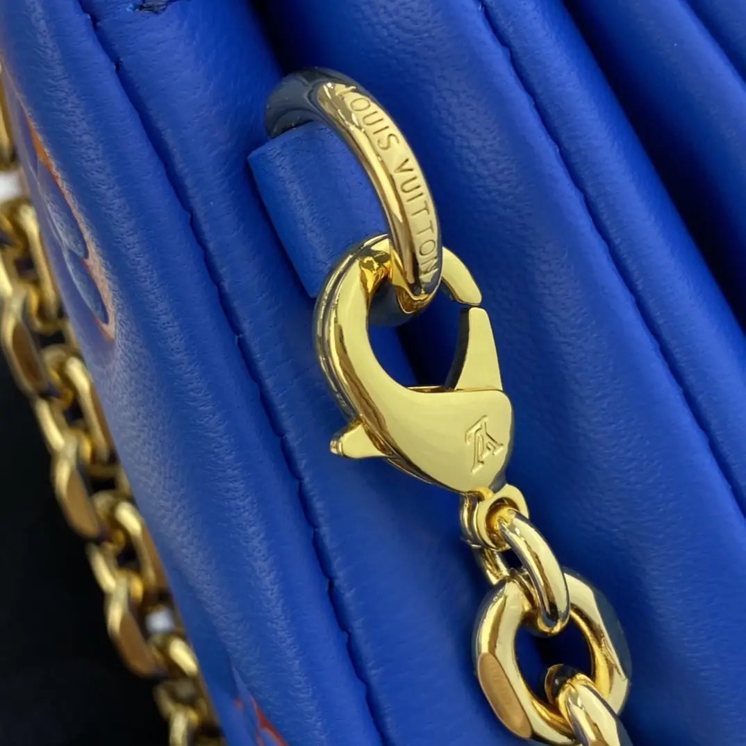 embossed lambskin pochette coussin blue red m80743 9