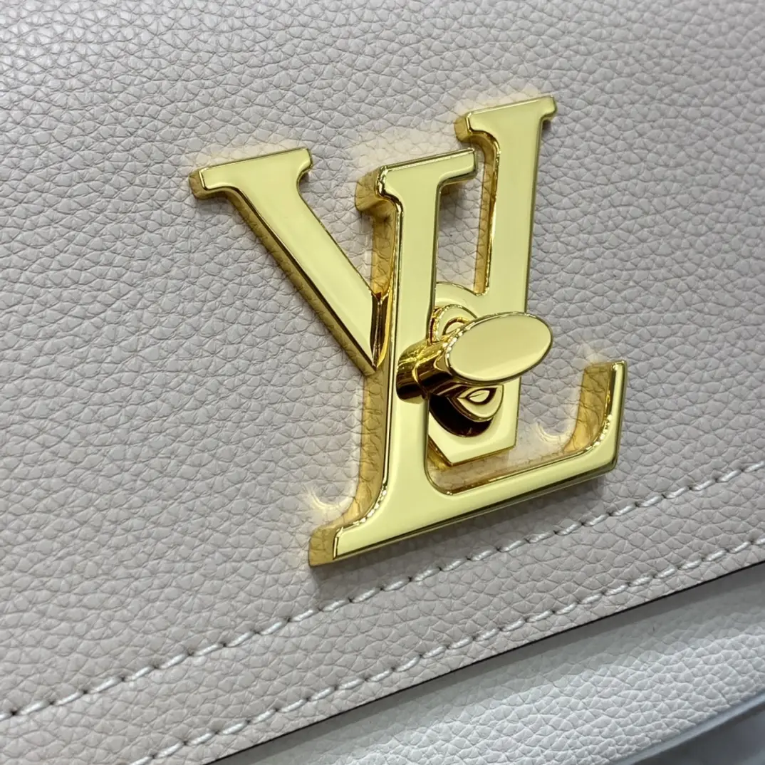 grained calf leather lockme tender m58554 5
