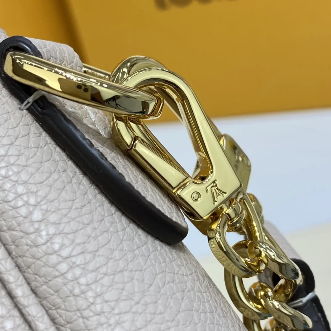 grained calf leather lockme tender m58554 9