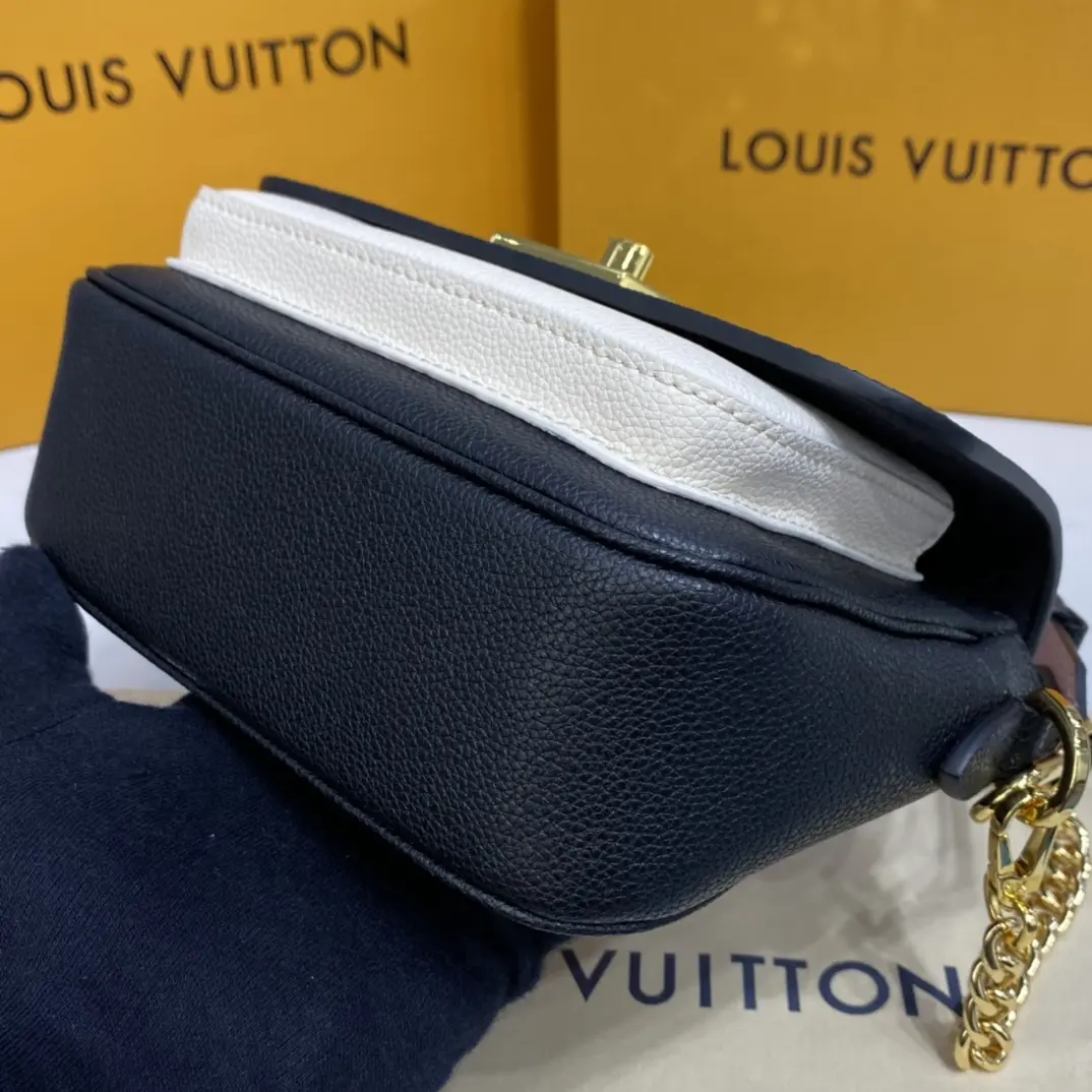 grained calf leather lockme tender m58557 8