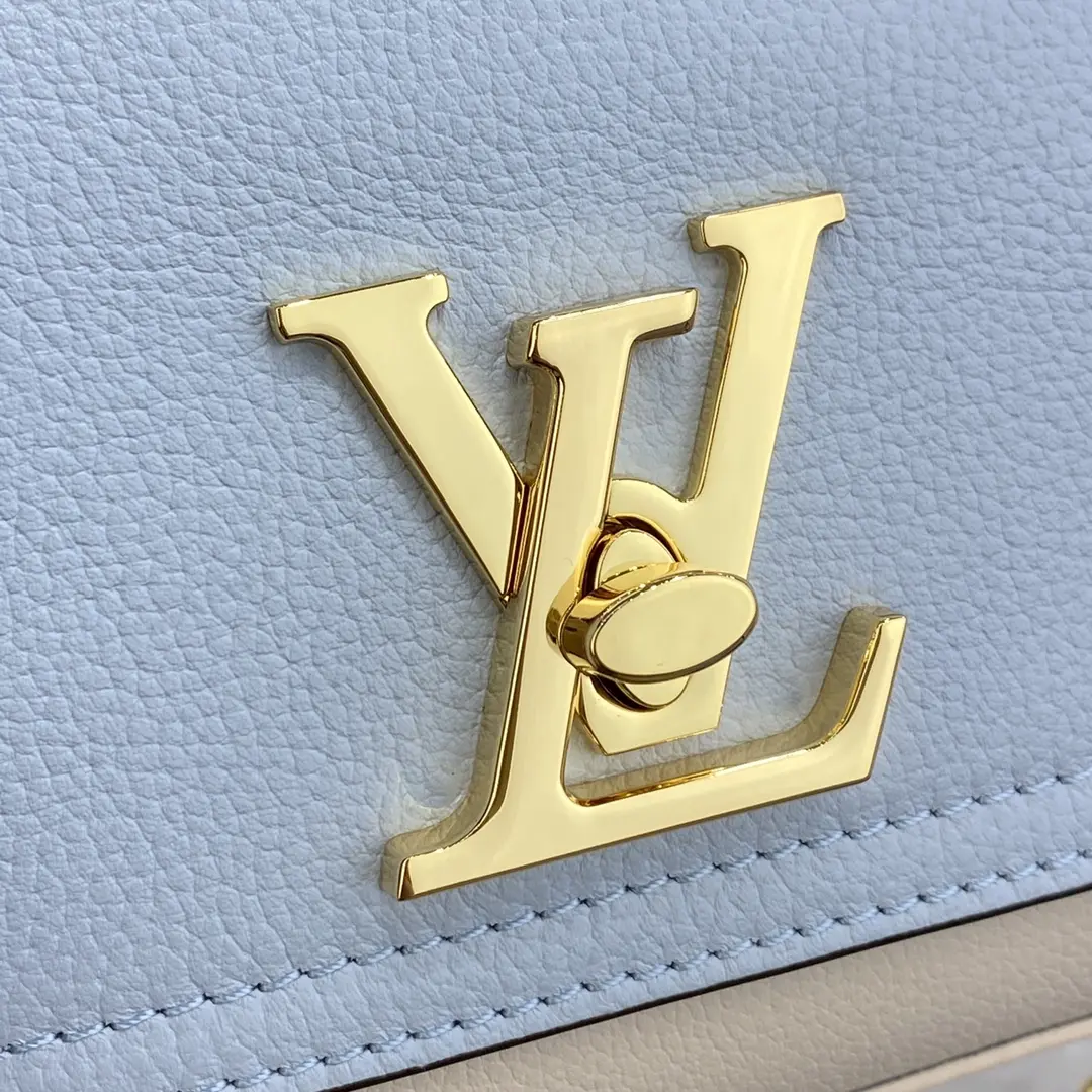 grained calf leather lockme tender m59984 3