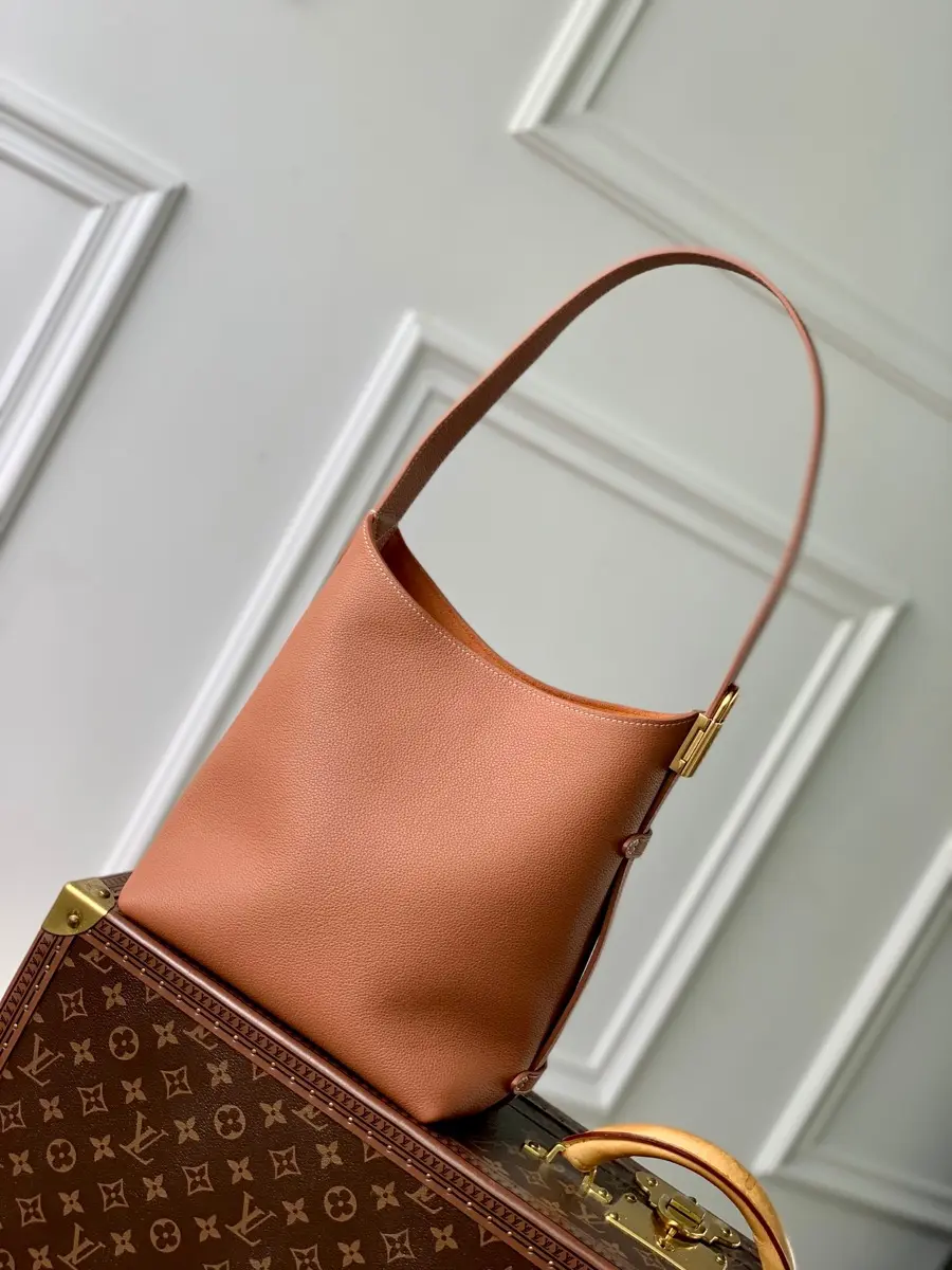 leather low key hobo pm bag brown m25354 7 leather low key hobo pm bag brown m25354 7