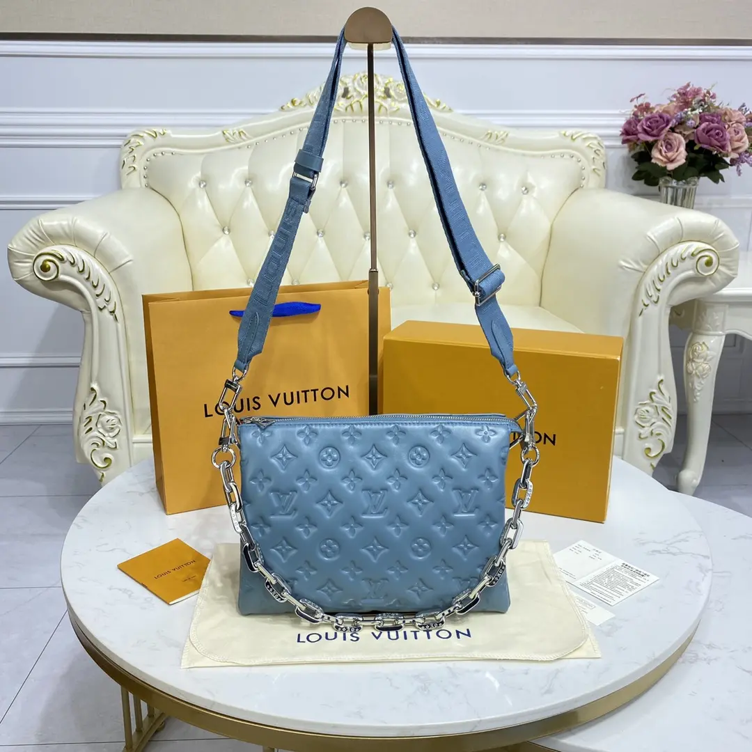 monogram embossed puffy coussin pm handbag m58699 4