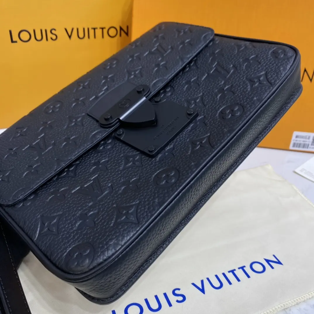 monogram embossed taurillon leather s lock a4 pouch black m80582 3 monogram embossed taurillon leather s lock a4 pouch black m80582 3