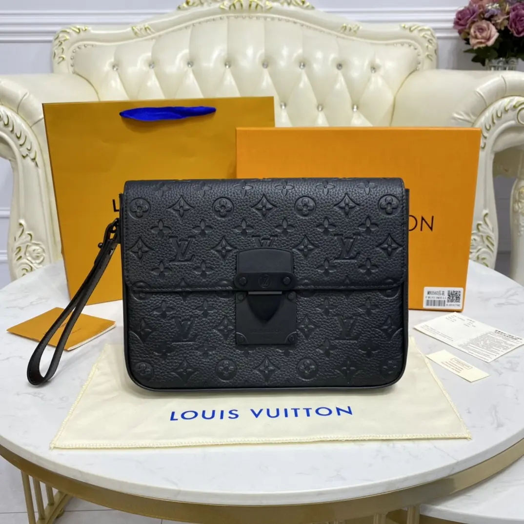 monogram embossed taurillon leather s lock a4 pouch black m80582 4 monogram embossed taurillon leather s lock a4 pouch black m80582 4