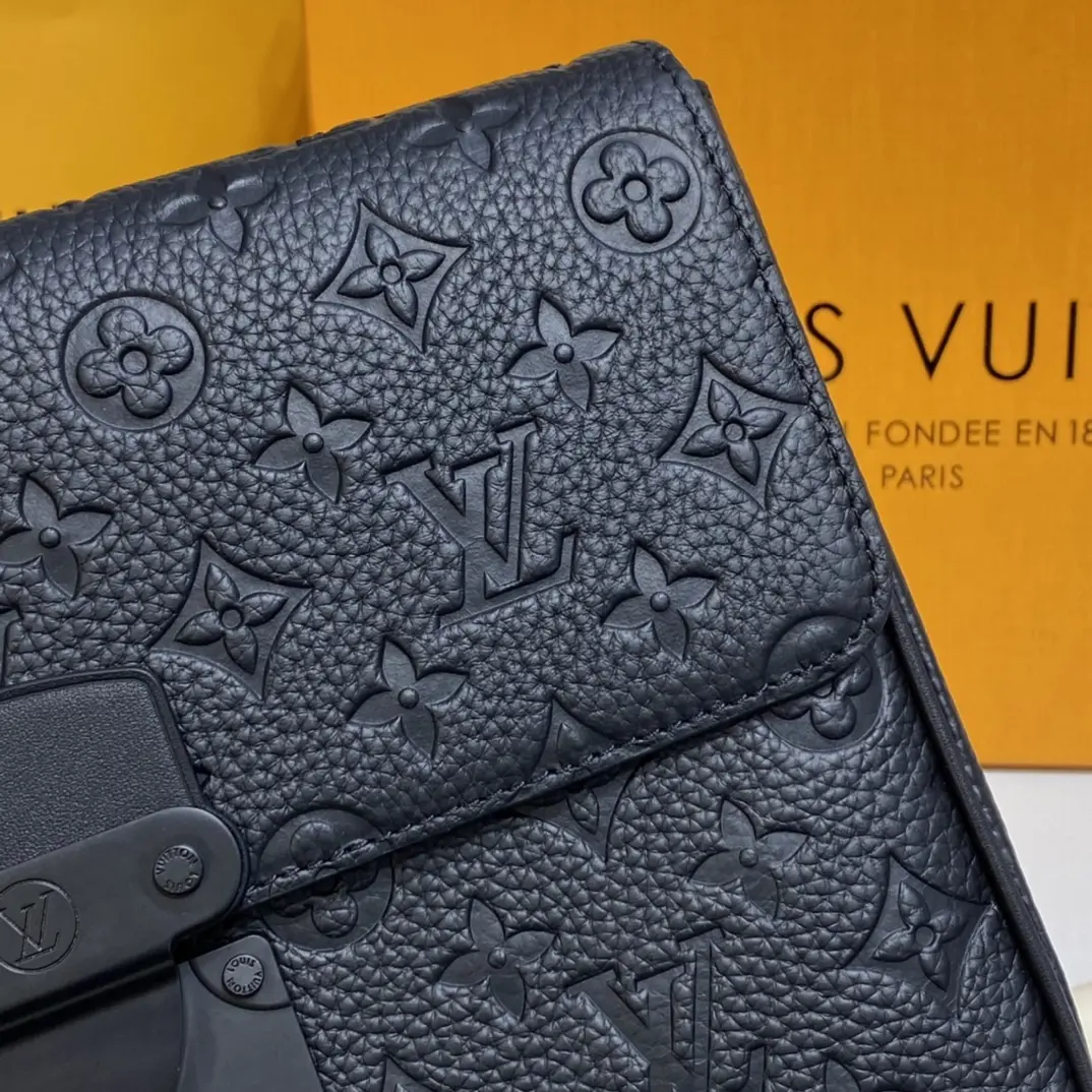 monogram embossed taurillon leather s lock a4 pouch black m80582 6 monogram embossed taurillon leather s lock a4 pouch black m80582 6