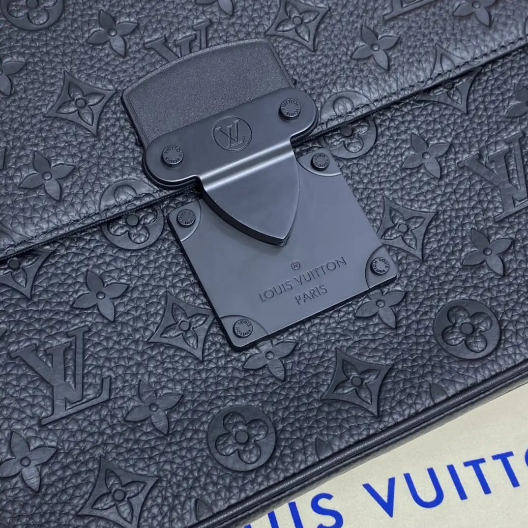 monogram embossed taurillon leather s lock a4 pouch black m80582 7 monogram embossed taurillon leather s lock a4 pouch black m80582 7