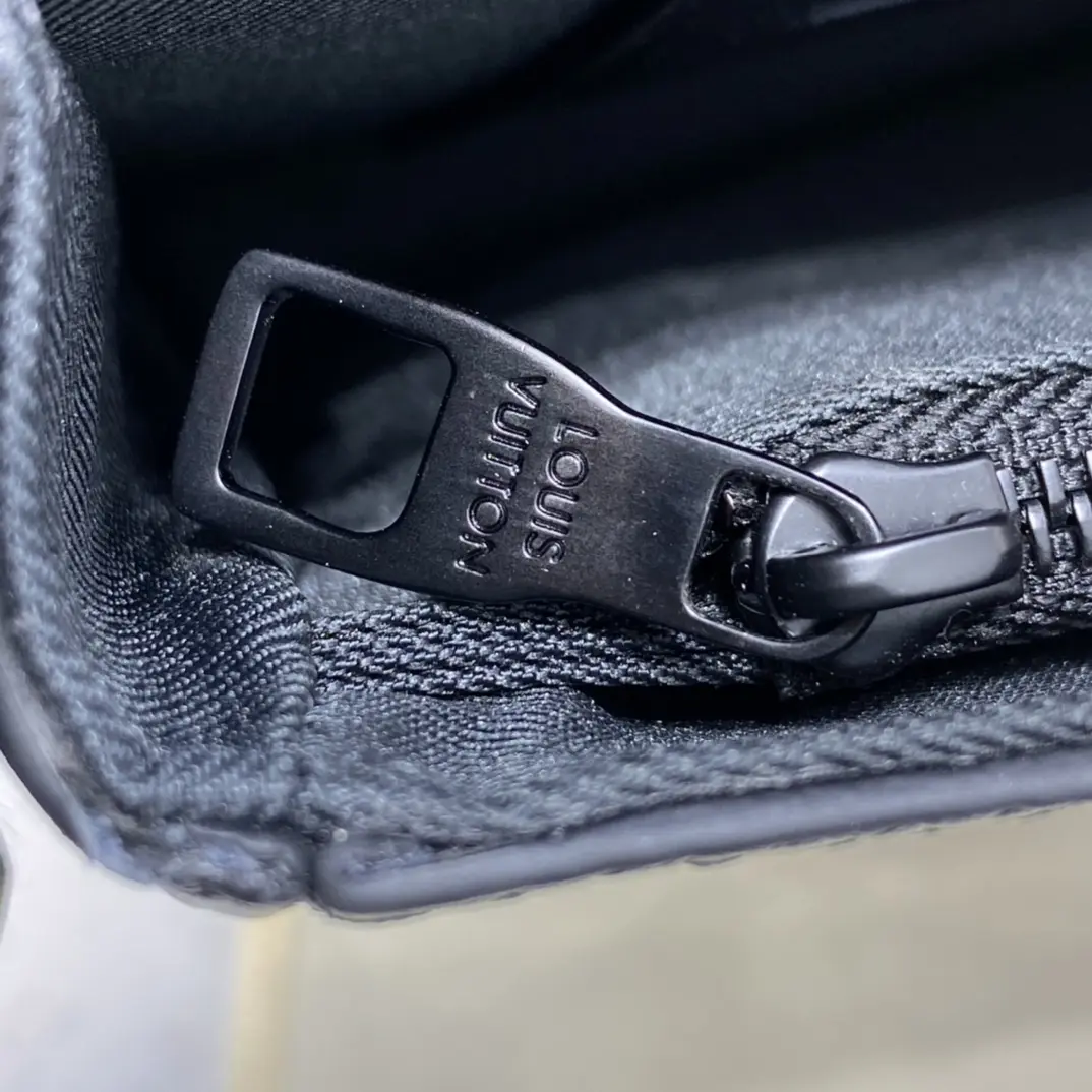 monogram embossed taurillon leather s lock a4 pouch black m80582 8 monogram embossed taurillon leather s lock a4 pouch black m80582 8