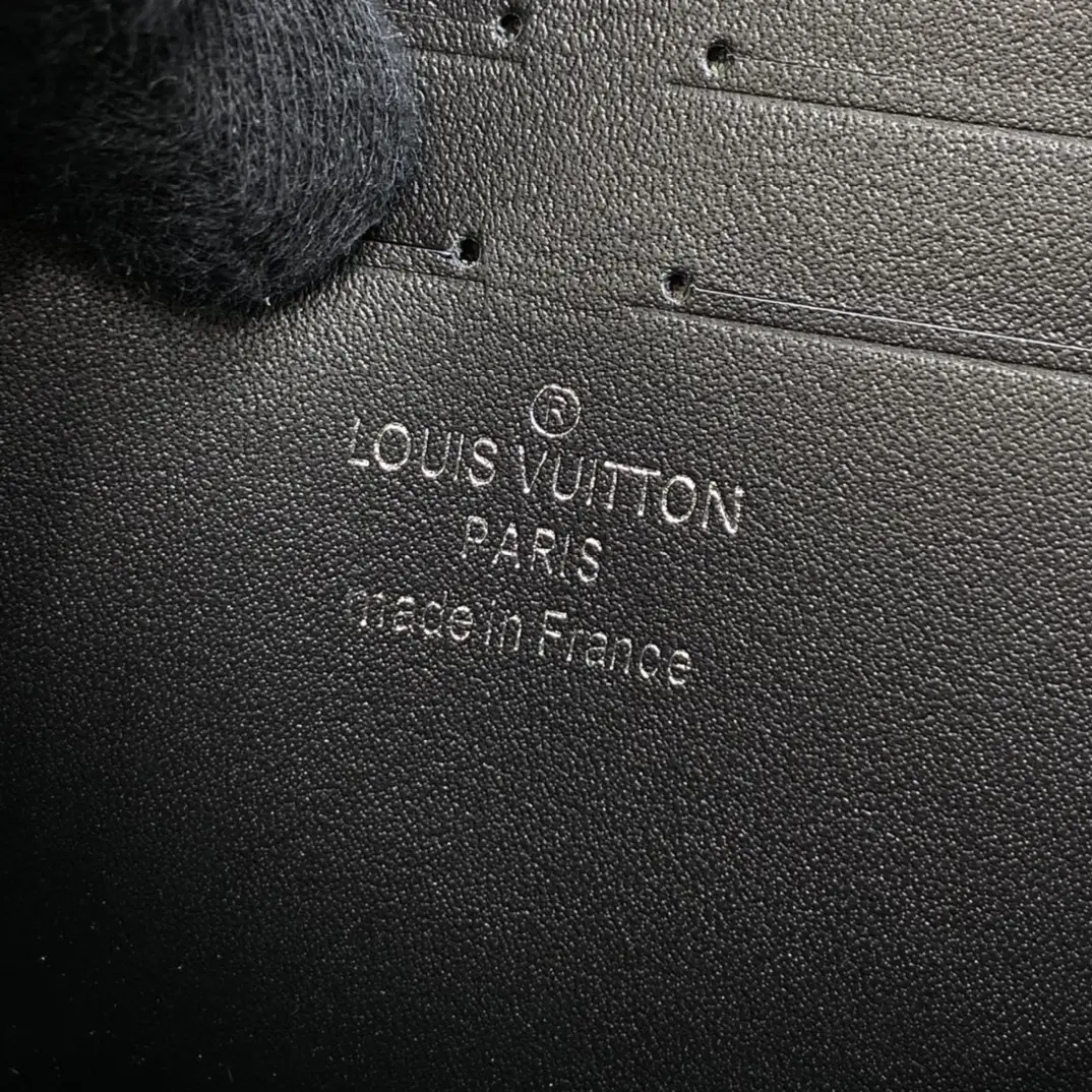 monogram embossed taurillon leather s lock a4 pouch black m80582 9 monogram embossed taurillon leather s lock a4 pouch black m80582 9