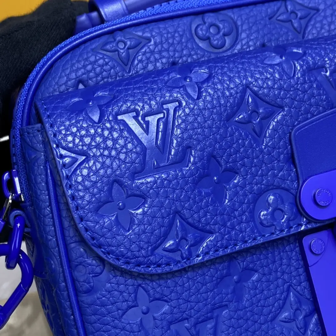 monogram embossed taurillon leather s lock messenger blue m58488 4