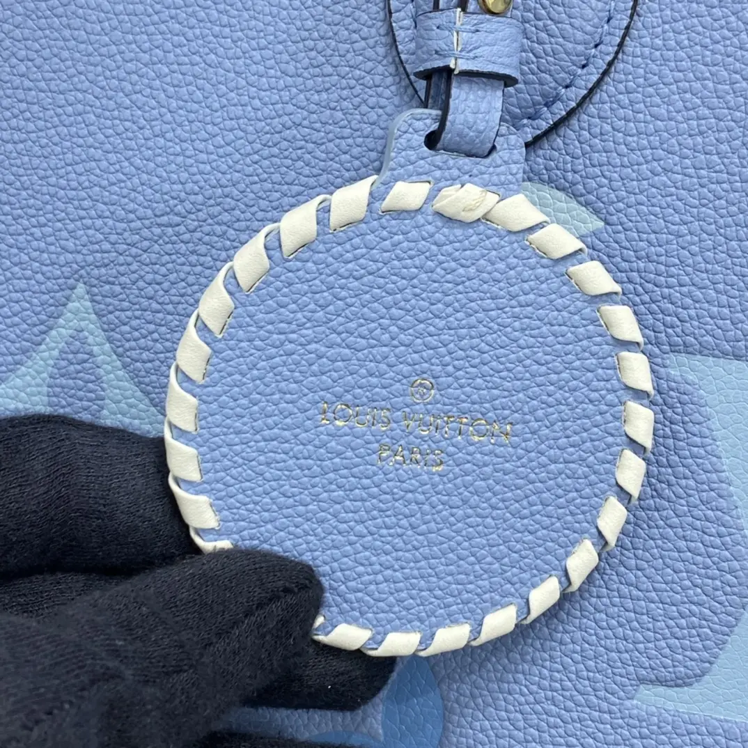 monogram empreinte by the pool collection onthego mm blue m45718 9 monogram empreinte by the pool collection onthego mm blue m45718 9