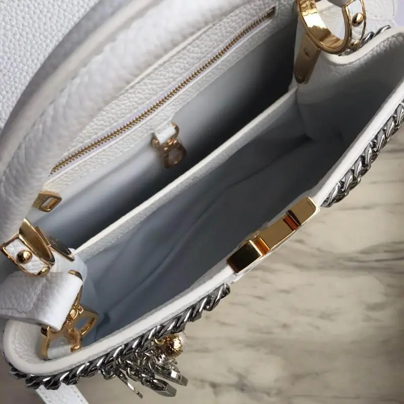 taurillon capucines pm white m52963 2