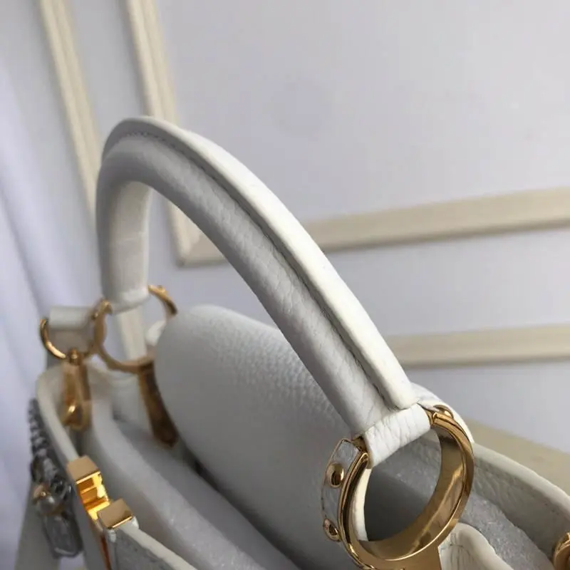 taurillon capucines pm white m52963 7