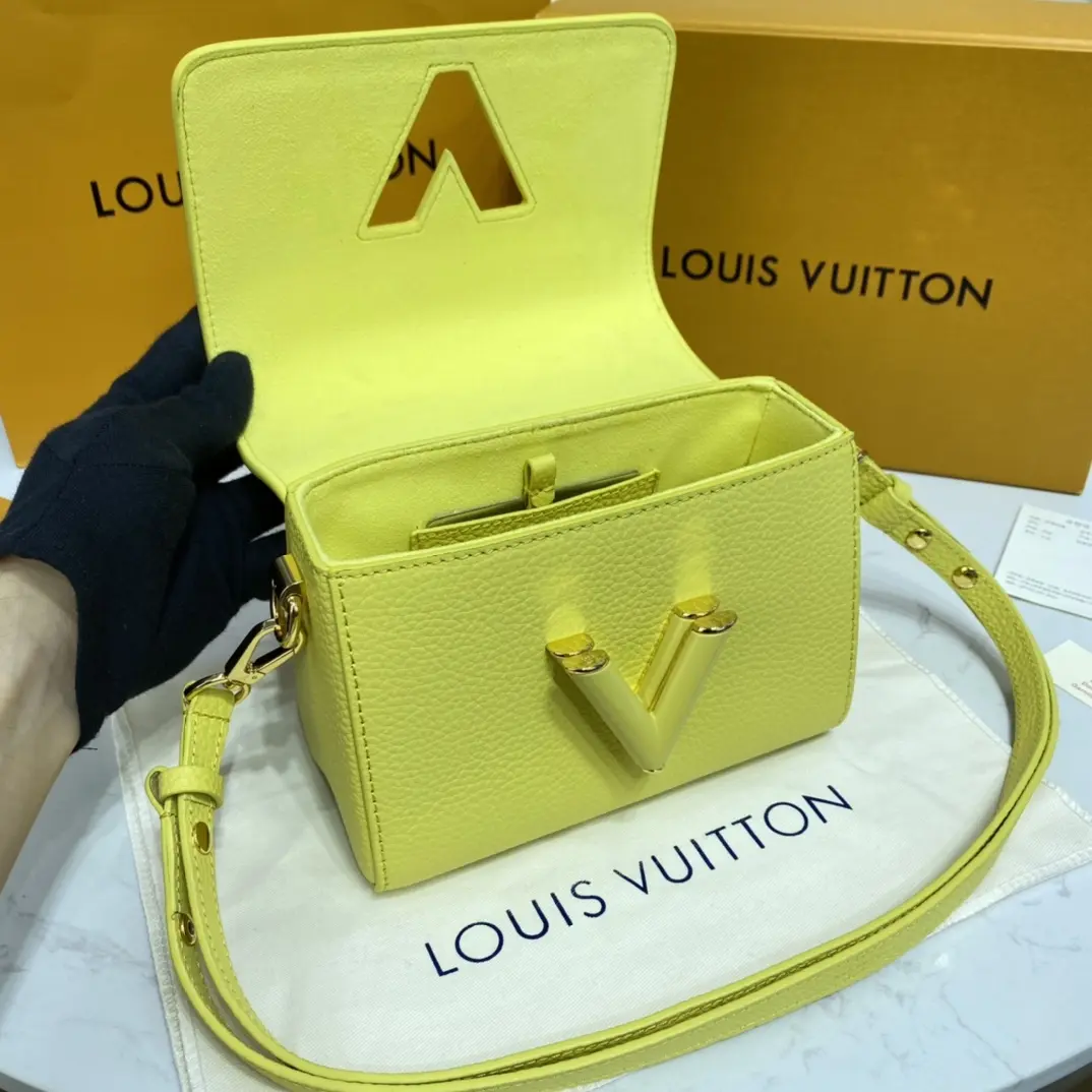 taurillon leather twist pm yellow m58571 2