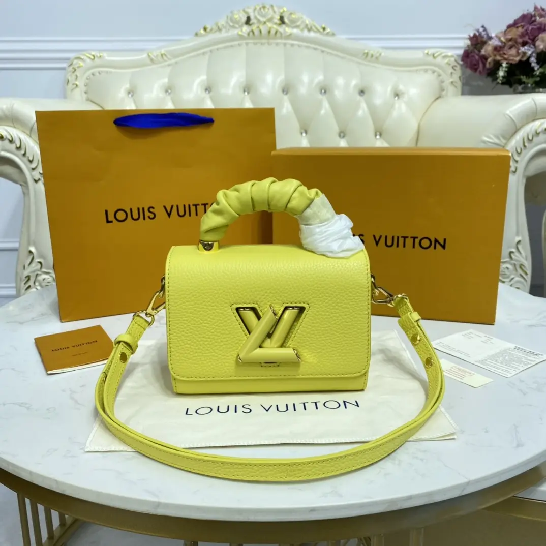 taurillon leather twist pm yellow m58571 4