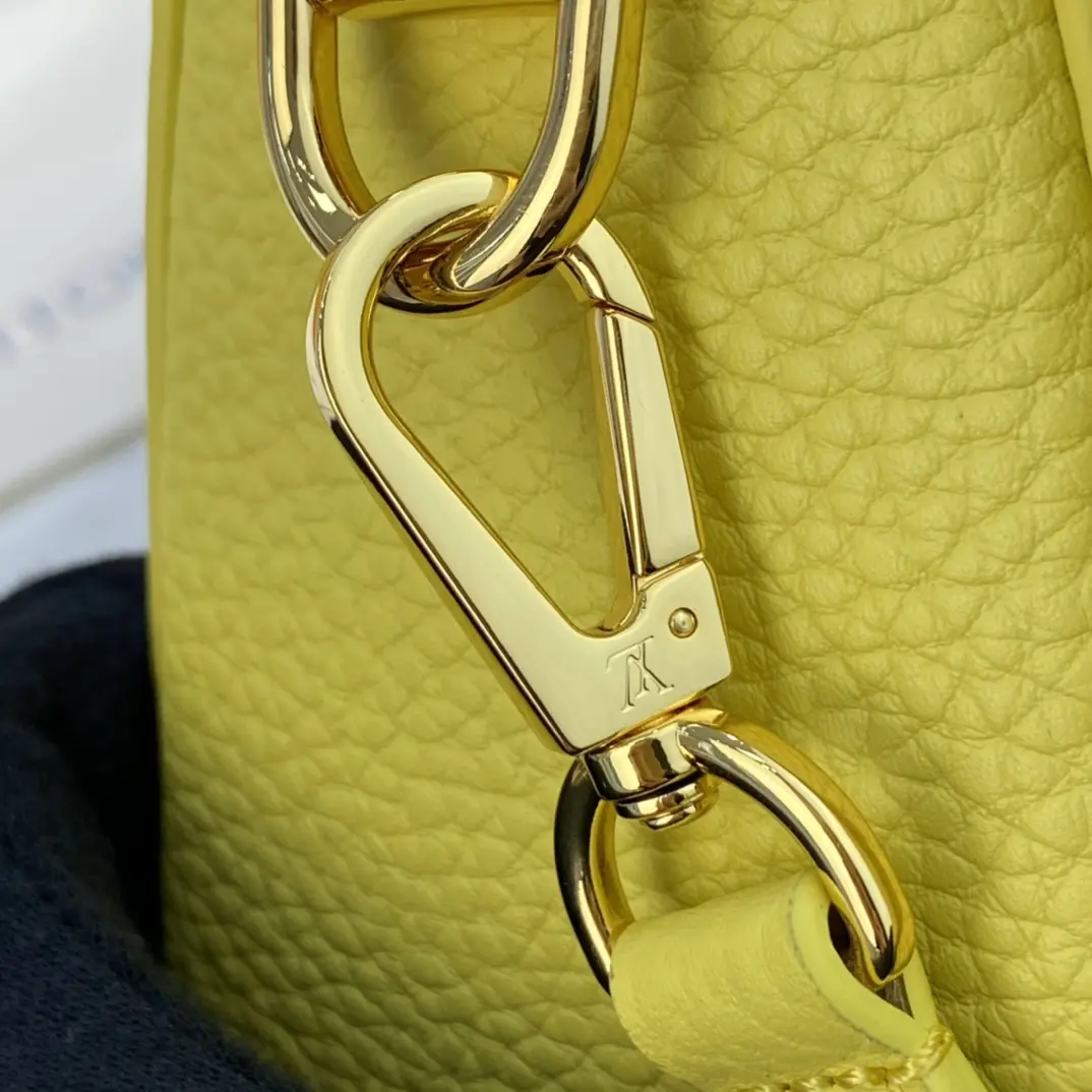 taurillon leather twist pm yellow m58571 5