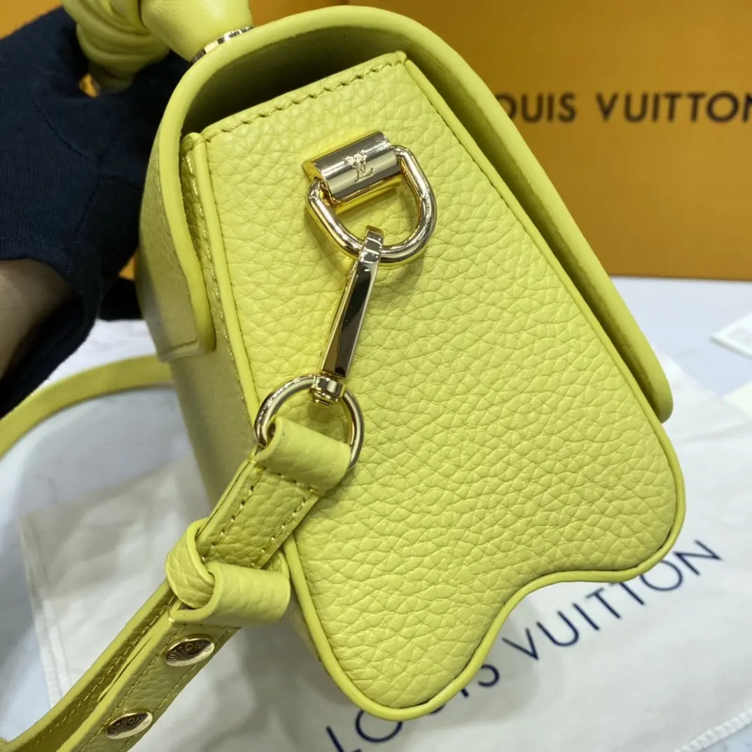 taurillon leather twist pm yellow m58571 6