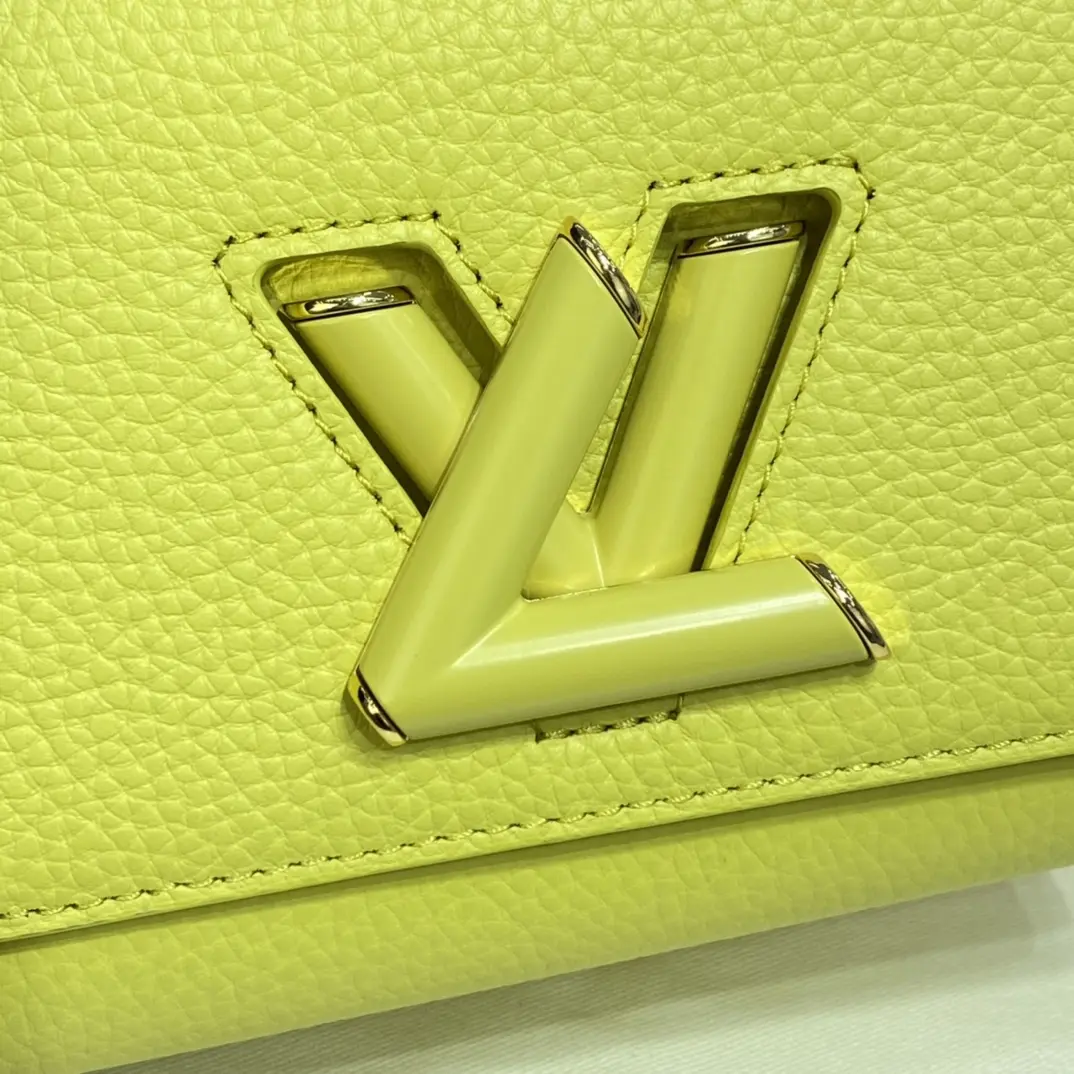 taurillon leather twist pm yellow m58571 7