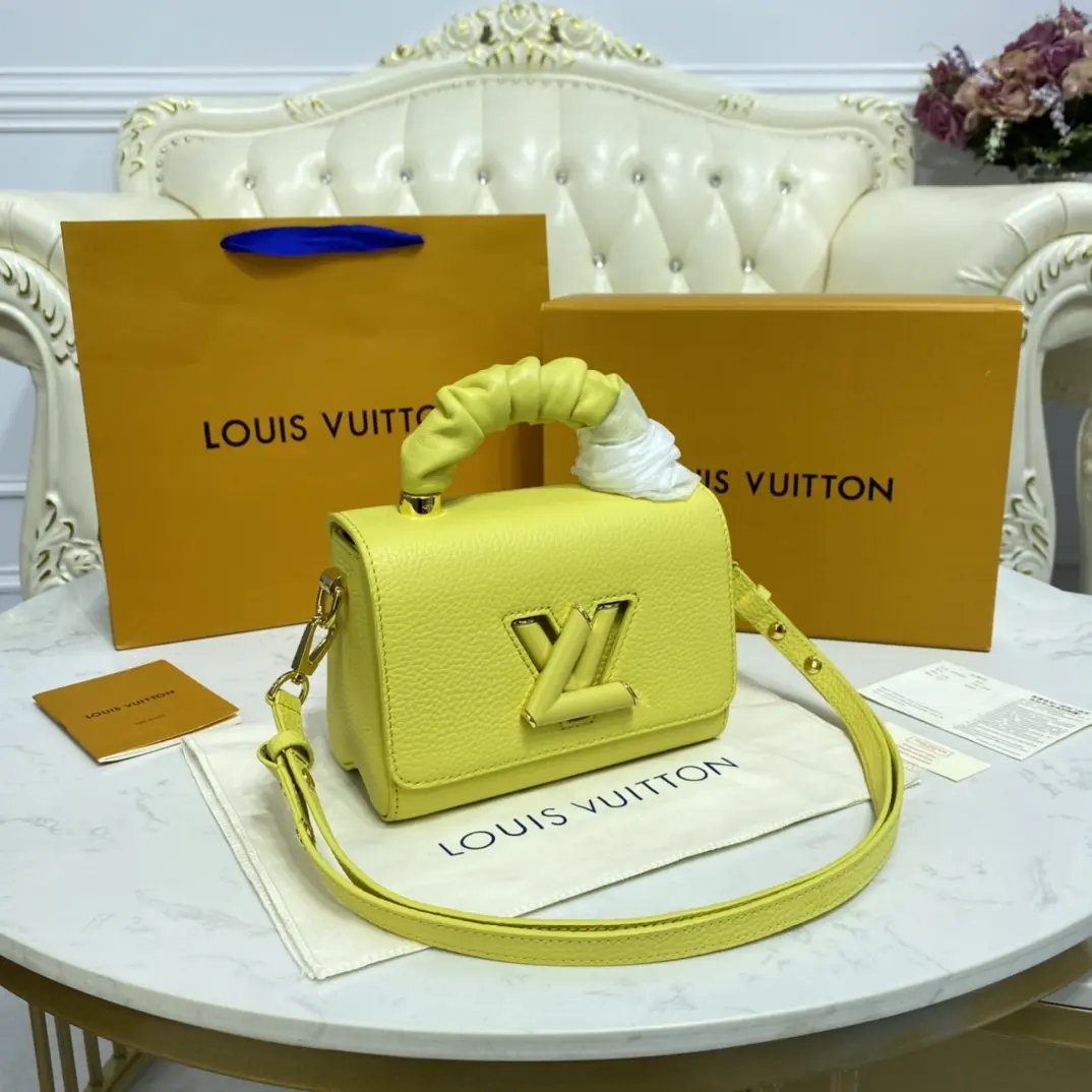 taurillon leather twist pm yellow m58571 8
