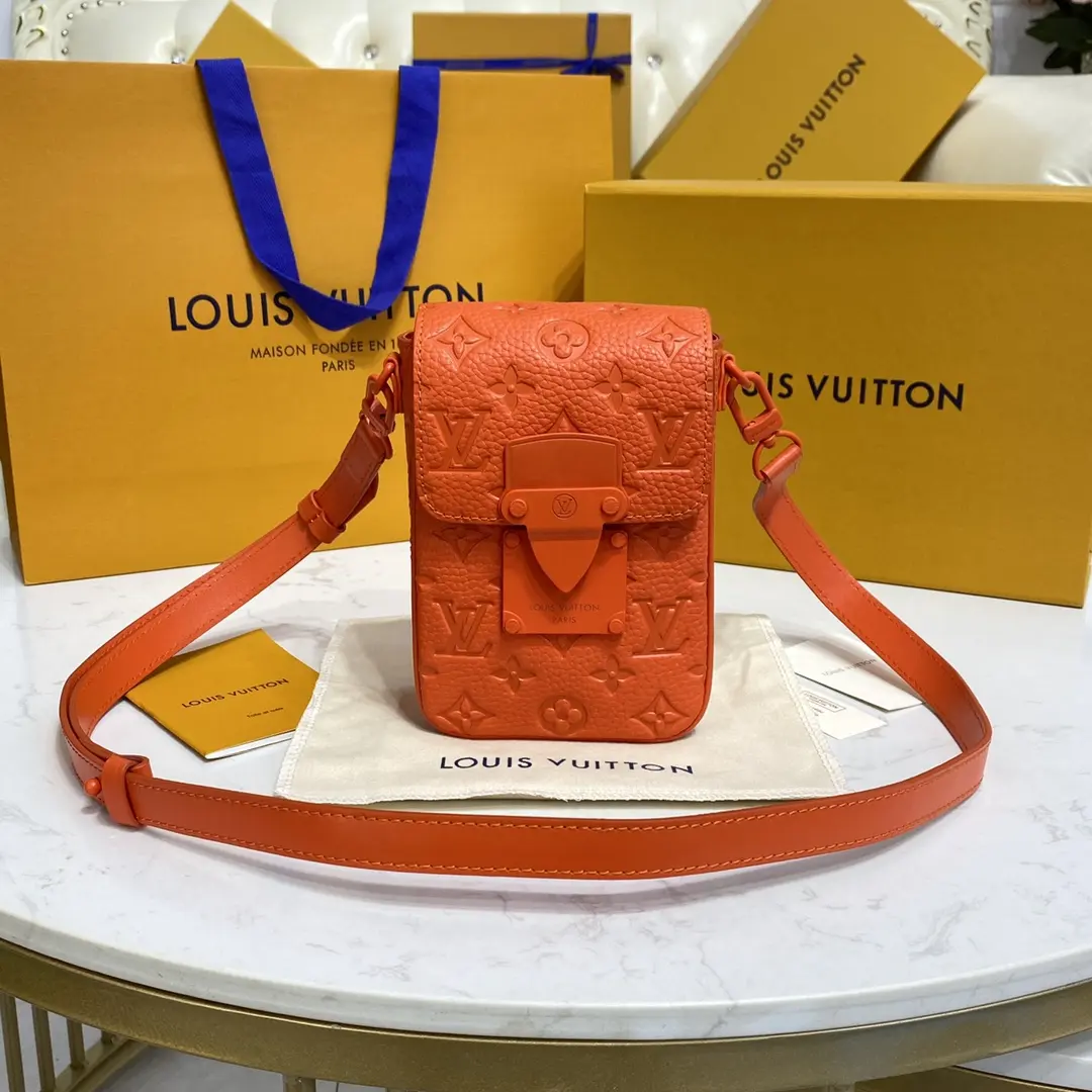 taurillon monogram s lock vertical wearable wallet orange m81525 orange 1