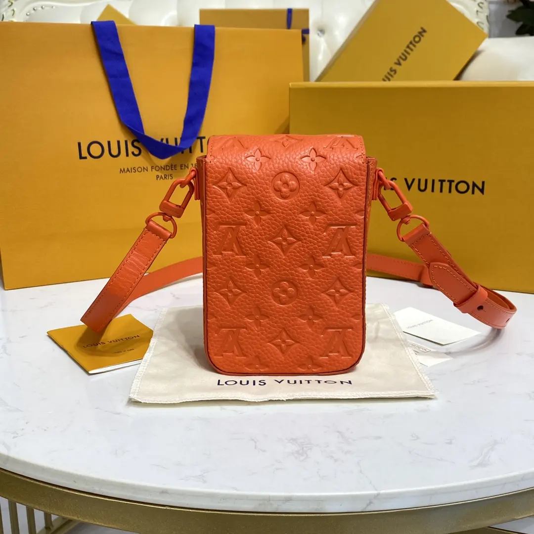 taurillon monogram s lock vertical wearable wallet orange m81525 orange 2