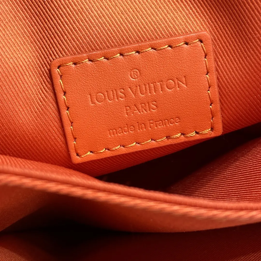 taurillon monogram s lock vertical wearable wallet orange m81525 orange 3