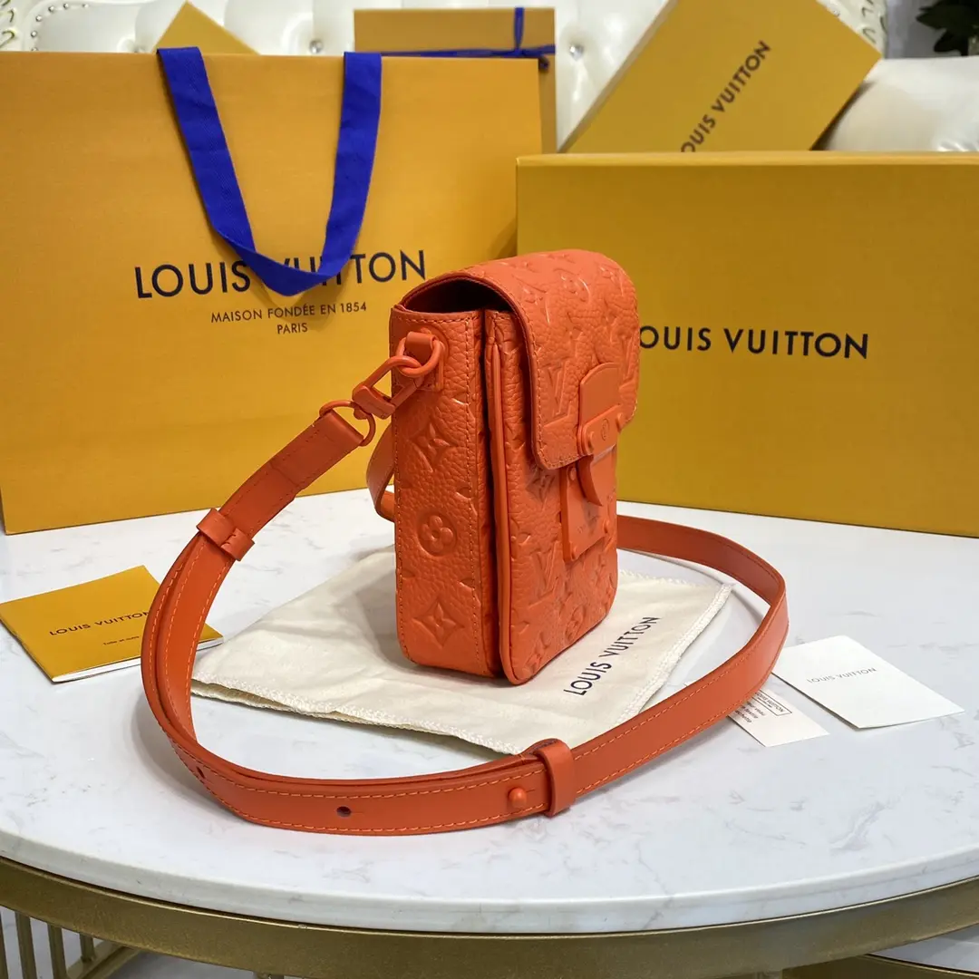taurillon monogram s lock vertical wearable wallet orange m81525 orange 4