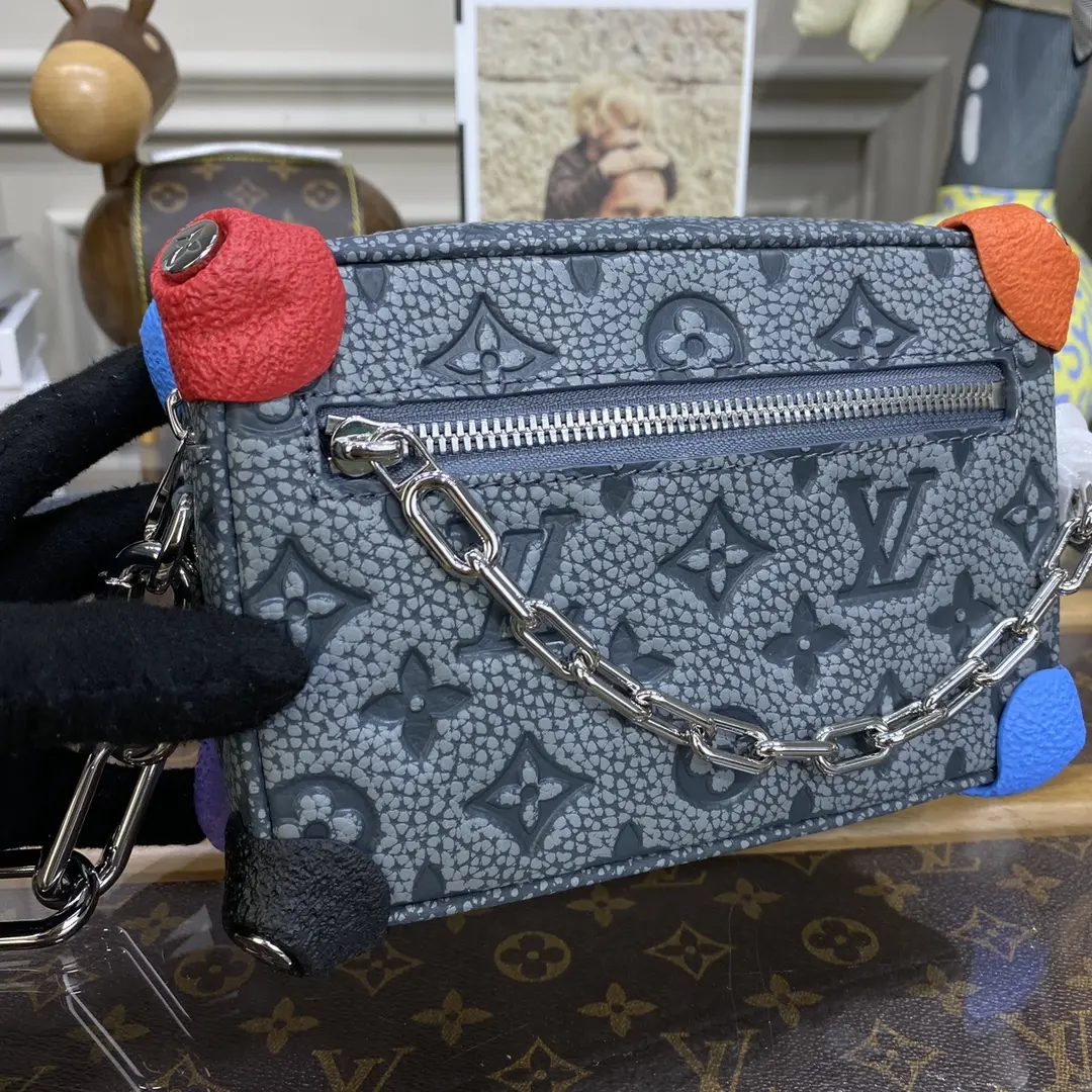 the houses emblematic monogram mini soft trunk bag gray m81606 gray 3 the houses emblematic monogram mini soft trunk bag gray m81606 gray 3