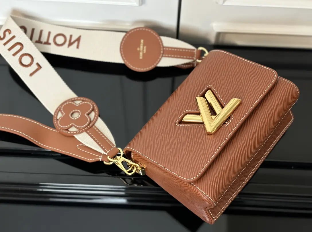 twist epi traveler handbag pm brown m24758 4 twist epi traveler handbag pm brown m24758 4