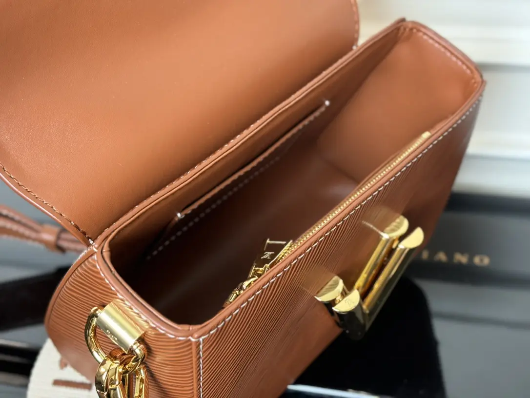 twist epi traveler handbag pm brown m24758 6 twist epi traveler handbag pm brown m24758 6