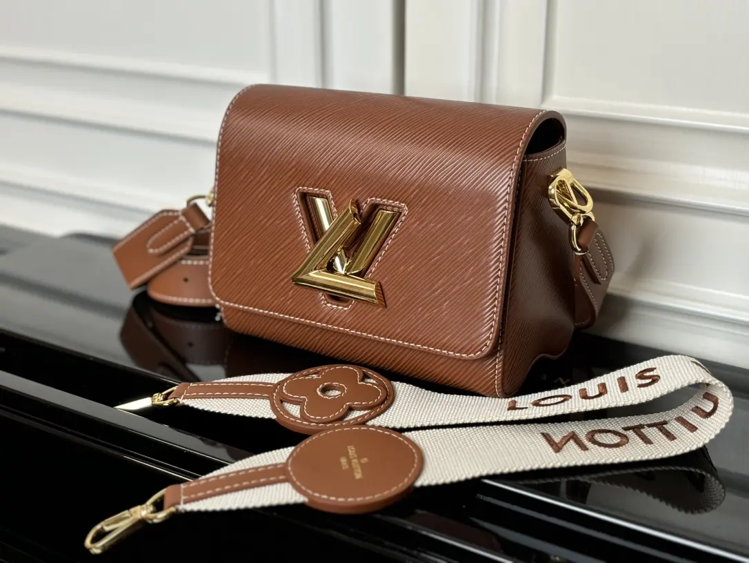 twist epi traveler handbag pm brown m24758 7 twist epi traveler handbag pm brown m24758 7