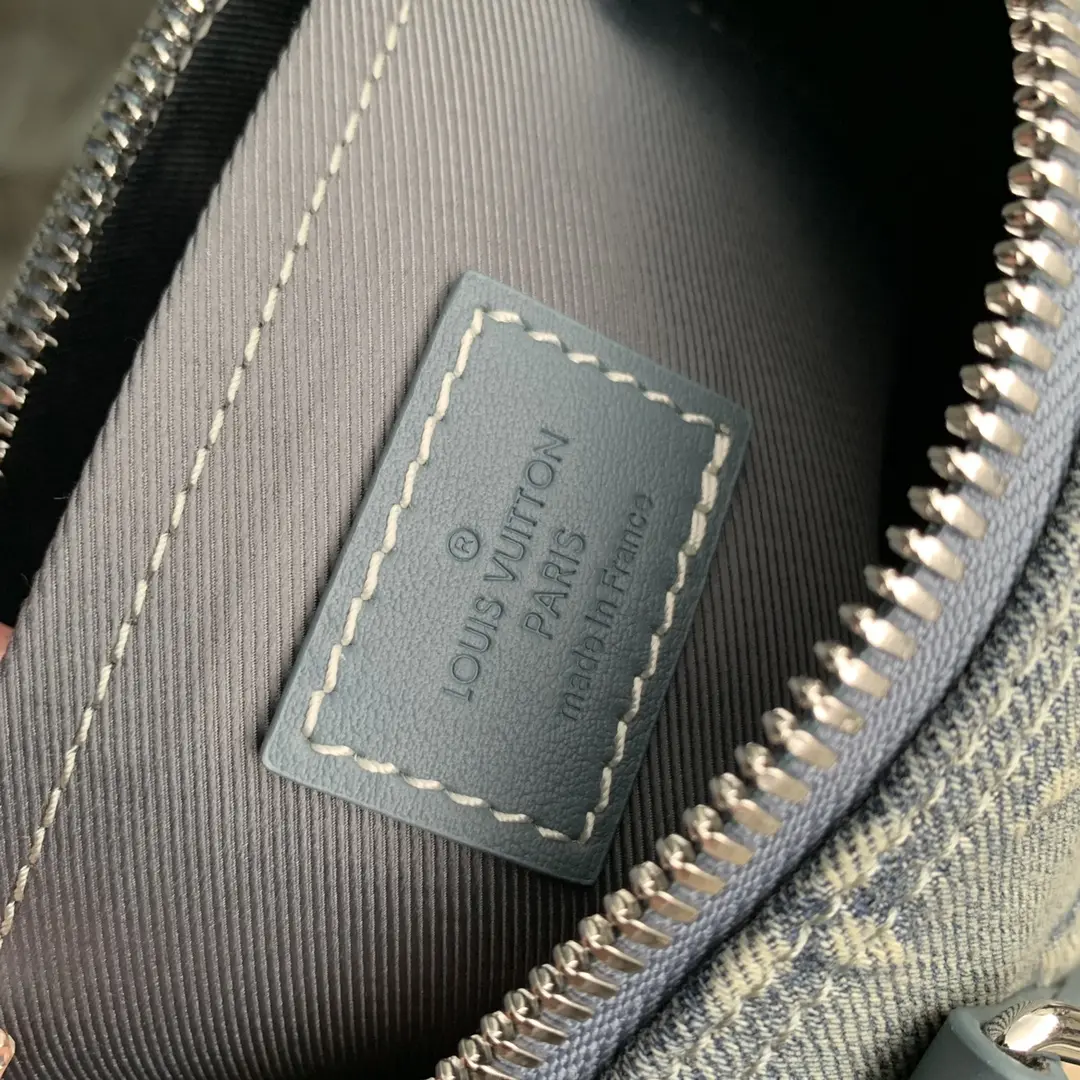 washed denim keepall bandouliere 25 handbag m22762 1 4 washed denim keepall bandouliere 25 handbag m22762 1 4