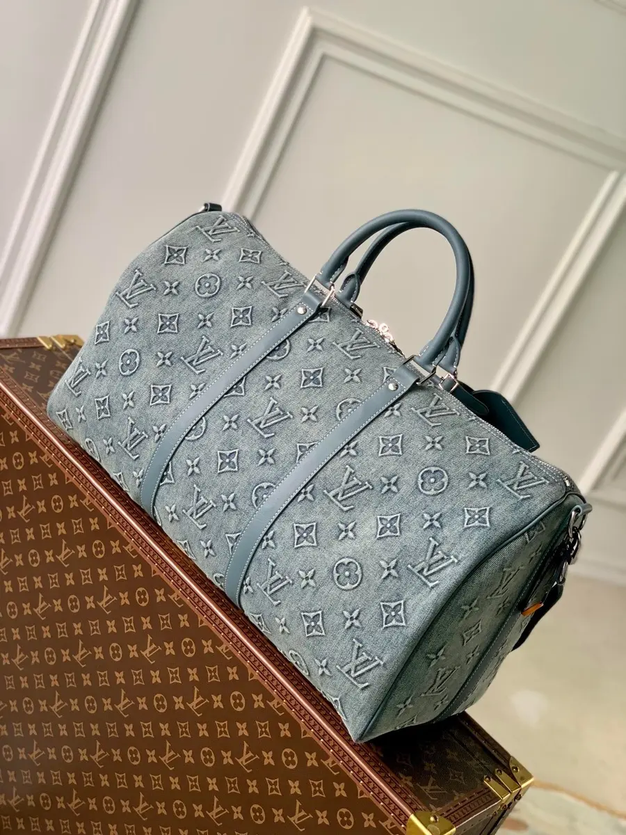washed denim keepall bandouliere 50 handbag m22532 1 10 washed denim keepall bandouliere 50 handbag m22532 1 10