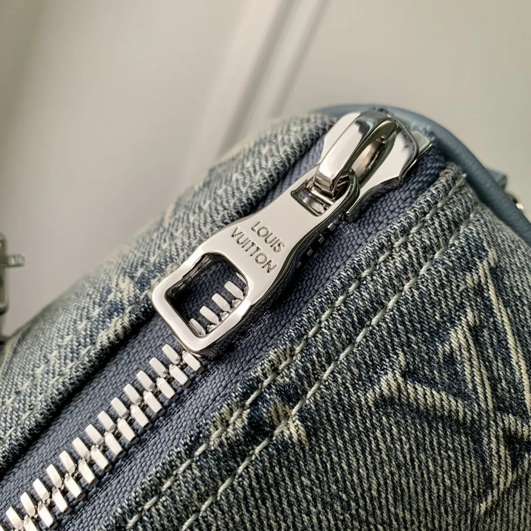 washed denim keepall bandouliere 50 handbag m22532 1 12 washed denim keepall bandouliere 50 handbag m22532 1 12