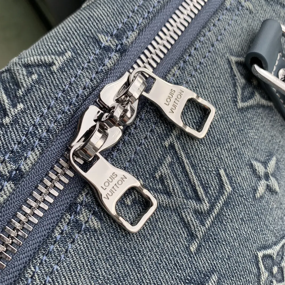 washed denim keepall bandouliere 50 handbag m22532 1 5 washed denim keepall bandouliere 50 handbag m22532 1 5